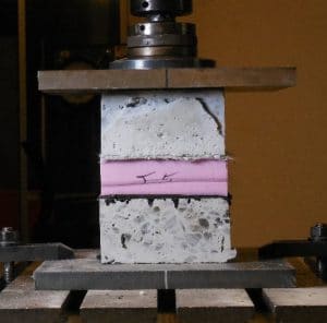 stiffness testing of combined concrete, insulation, drainage board, and waterproofing system