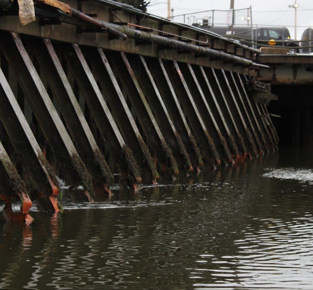 Investigation and Initial Stability Analysis of a Wharf on Severely Deteriorated Steel H-Piles