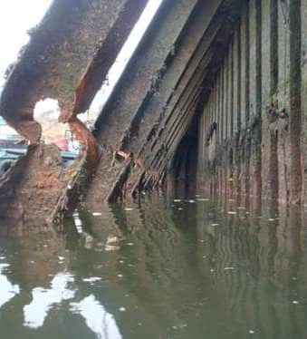 Case Study on the Collapse Potential of a Wharf Supported by Severely Deteriorated Steel Piles under Gravitational Loads
